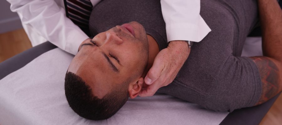 A man being assessed for a concussion at Broadview Health Centre