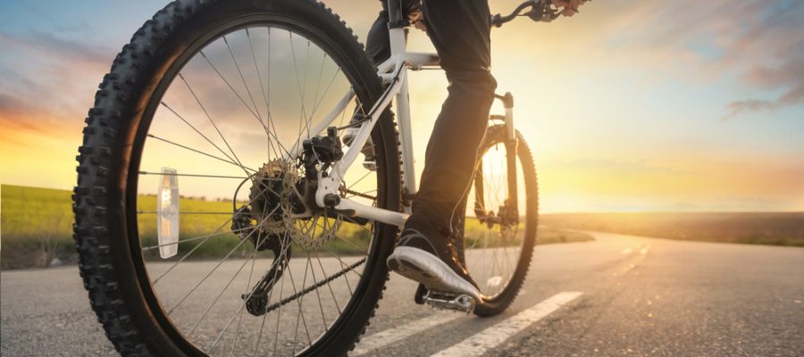 person riding bike with balance issues