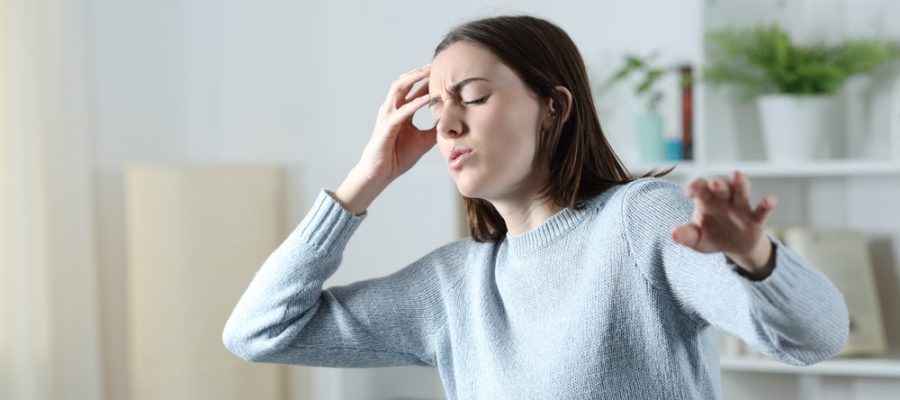 woman with balance disorder vertigo