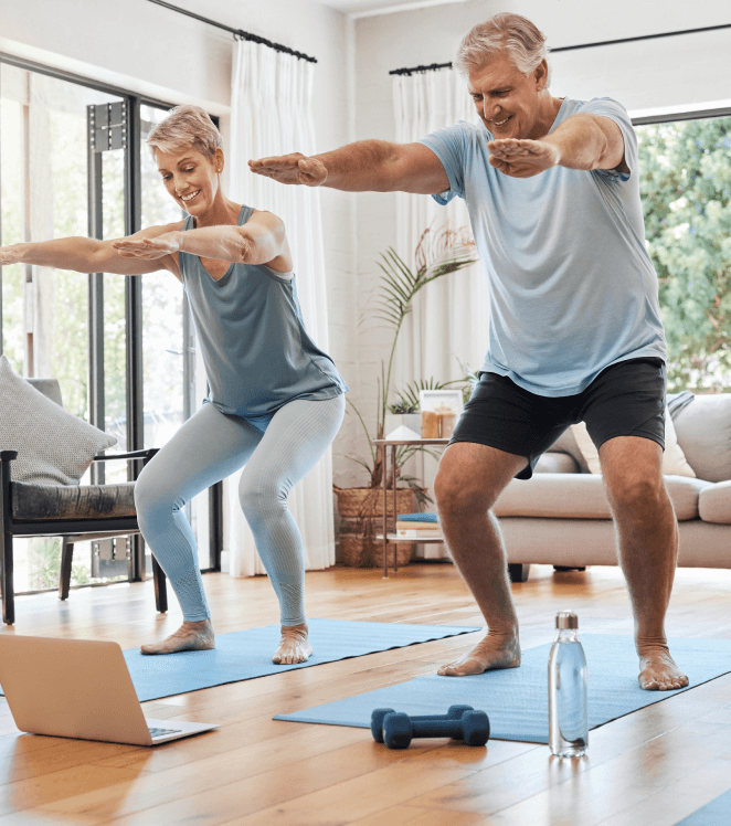 older couple doing yoga