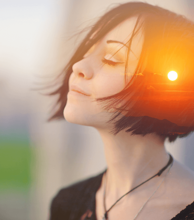 woman smiling sunset